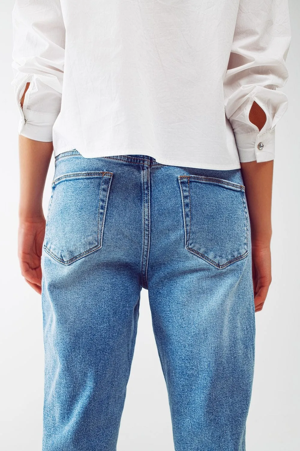 Ripped Knee Straight Leg Jeans In Light Blue Wash